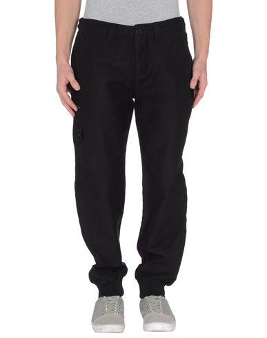 ZOOM CALVIN KLEIN JEANS - Casual pants