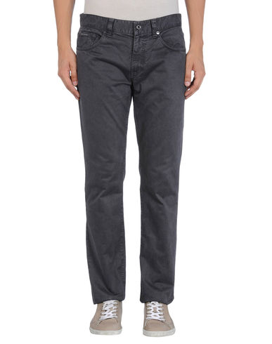 ZOOM CALVIN KLEIN JEANS - Casual pants