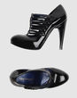 LUCA VALENTINI - Closed-toe slip-ons 