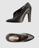 LUCA VALENTINI - Closed-toe slip-ons 