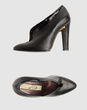 LUCA VALENTINI - Closed-toe slip-ons 