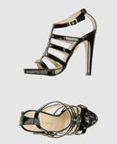CHARLOTTE OLYMPIA - Sandali con plateau