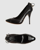ALEXANDER MCQUEEN - Decolletes con plateau