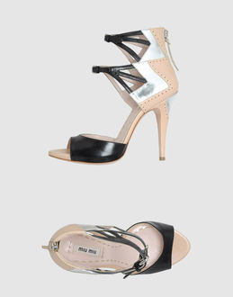 MIU MIU - CALZATURE - Sandali con plateau - su YOOX.COM