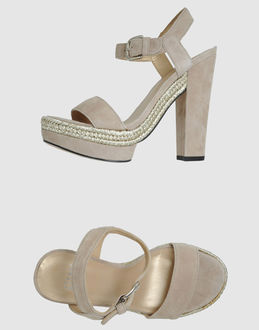 STUART WEITZMAN - CALZATURE - Sandali con plateau - su YOOX.COM