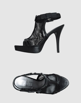 GUESS - CALZATURE - Sandali con plateau - su YOOX.COM