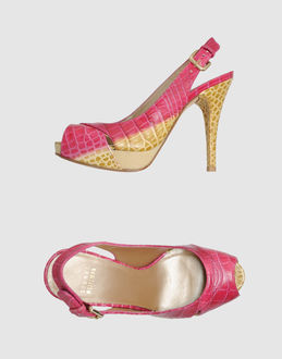 STUART WEITZMAN - CALZATURE - Sandali con plateau - su YOOX.COM