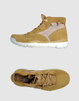 NIKE - CALZATURE - Sneakers alte - su YOOX.COM