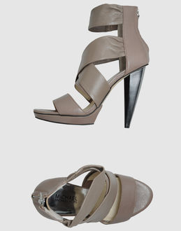 MICHAEL MICHAEL KORS - CALZATURE - Sandali con plateau - su YOOX.COM