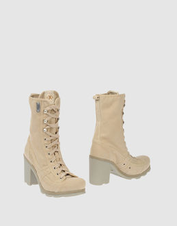 O.X.S. - CALZATURE - Stivaletti - su YOOX.COM