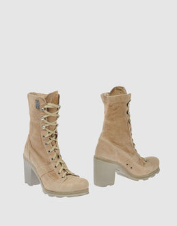 O.X.S. - CALZATURE - Stivaletti - su YOOX.COM