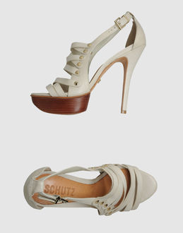 SCHUTZ - CALZATURE - Sandali con plateau - su YOOX.COM