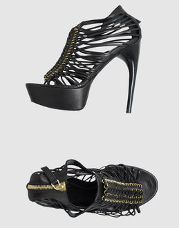 ALEXANDER MCQUEEN - CALZATURE - Sandali con plateau - su YOOX.COM