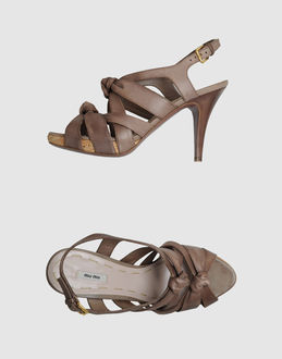 MIU MIU - CALZATURE - Sandali con plateau - su YOOX.COM