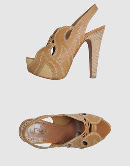 ALAIA - CALZATURE - Sandali con plateau - su YOOX.COM