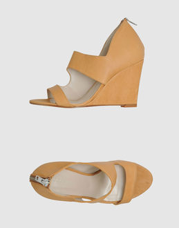 TATOOSH - CALZATURE - Zeppe - su YOOX.COM