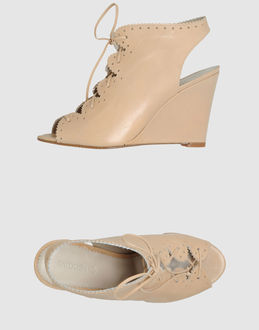 TATOOSH - CALZATURE - Zeppe - su YOOX.COM