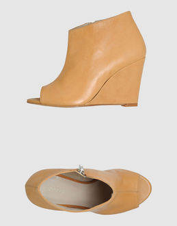 TATOOSH - CALZATURE - Zeppe - su YOOX.COM