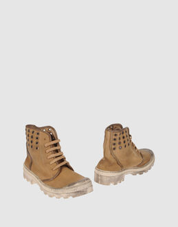 UNUSUAL.CODE - CALZATURE - Anfibi - su YOOX.COM