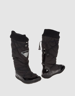 DIESEL - CALZATURE - Stivali - su YOOX.COM