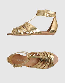 GUESS - CALZATURE - Sandali - su YOOX.COM