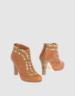 DOLORES PROMESAS - CALZATURE - Stivaletti - su YOOX.COM