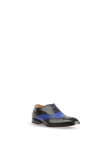 Laced shoes