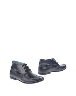 DÉBUT. Read on. Solid colour Laces No appliqués Flat heel Round DÉBUT. Read on. Solid colour Laces No appliqués Flat heel Round