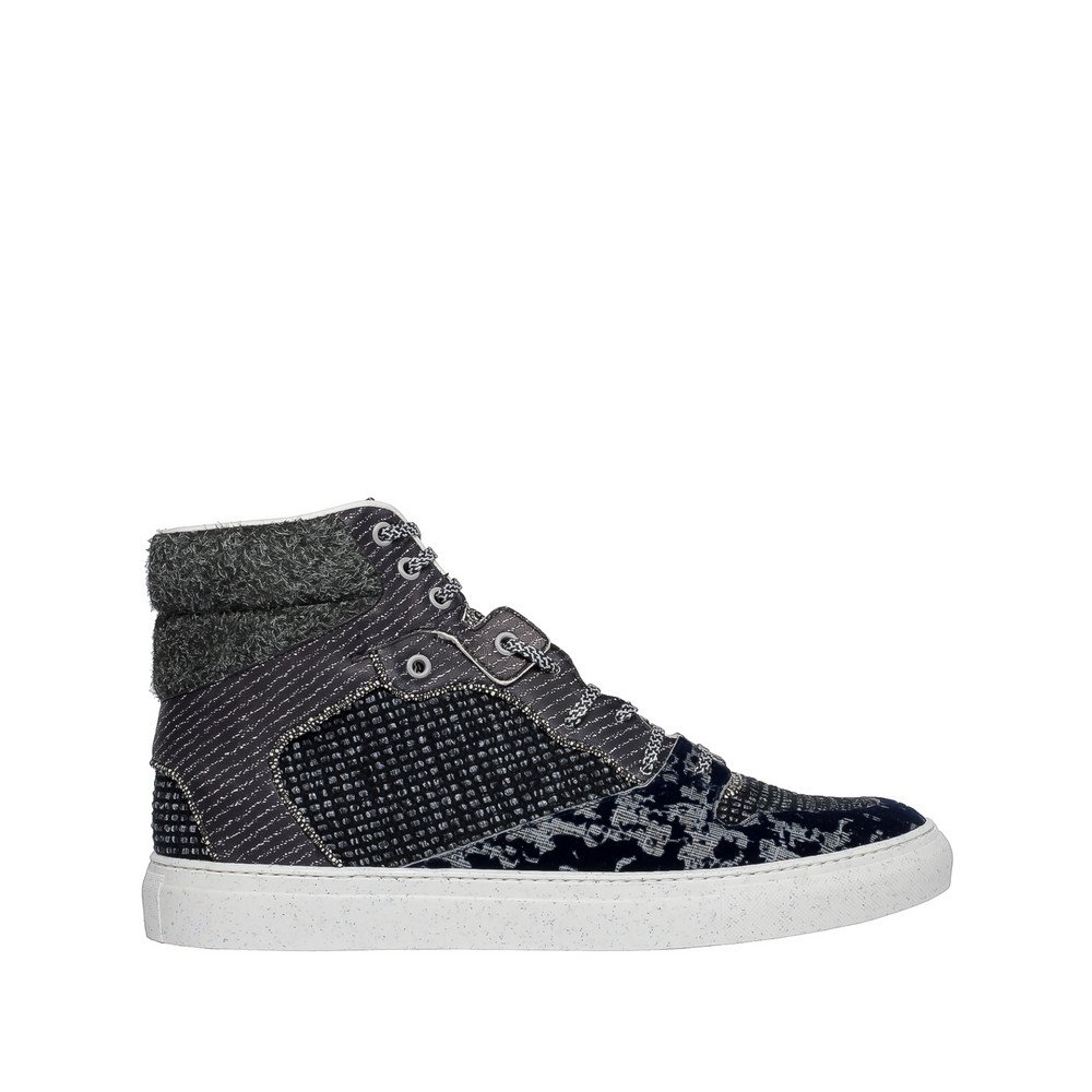 Balenciaga Sneakers Hautes Multimatières Tweed
Balenciaga Sneakers Hautes Multimatières Tweed
