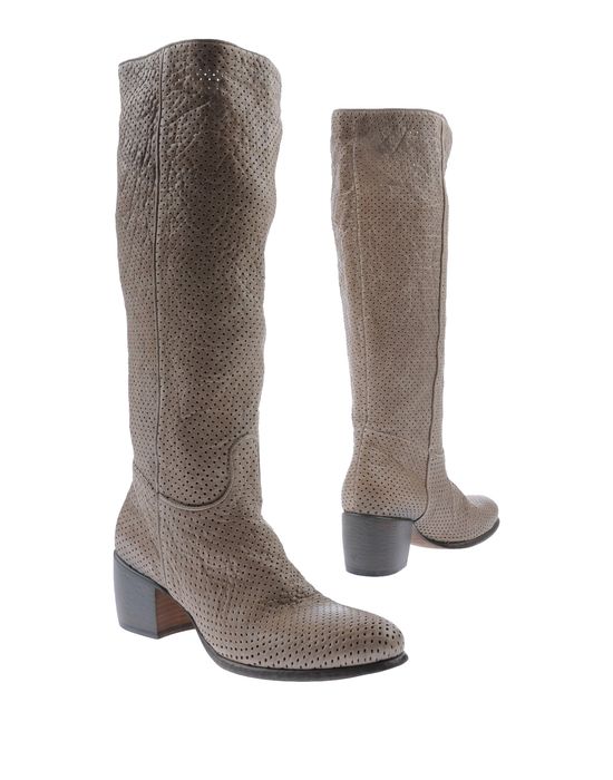 Beige boots from Rocco P; Heel height: 2.54 inches; Soft leather; hand