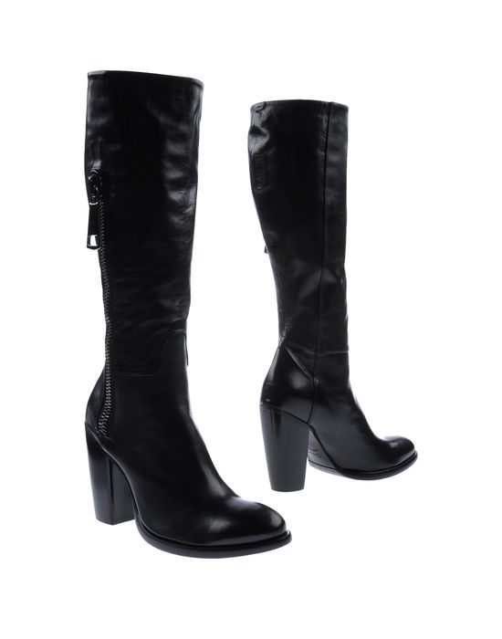 Black boots from Rocco P; Heel height: 4.29 inches; Calf-skin leather