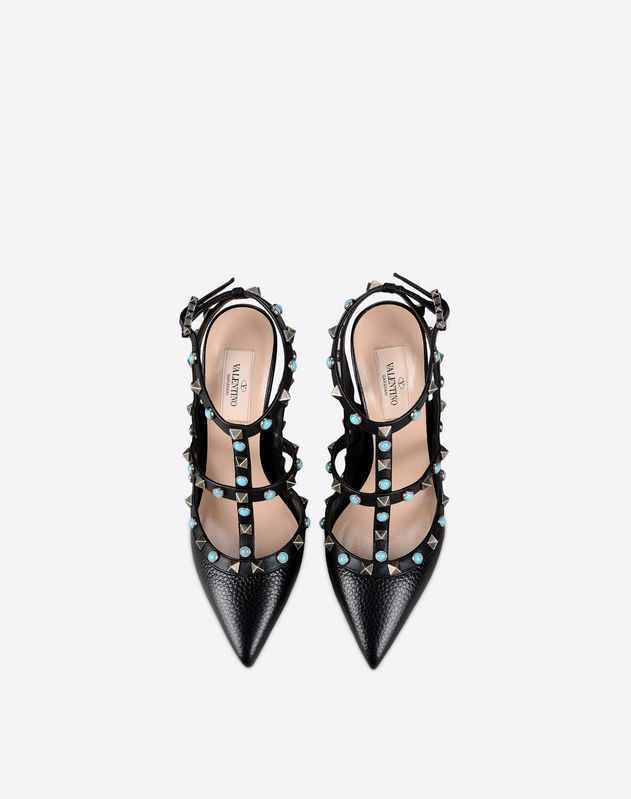 Contrasting applications<br>Textured leather<br>Solid color<br>Side buckle closure<br>Leather sole<br>Narrow toeline<br>Covered heel<br> Women 44964378OX