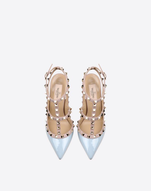 Studs<br>Two-tone pattern<br>Buckling ankle strap closure<br>Leather sole<br>Varnished effect<br>Narrow toeline<br>Covered heel<br> Women 44965544XE