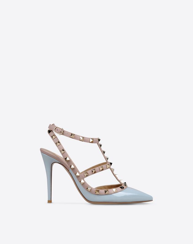Studs<br>Two-tone pattern<br>Buckling ankle strap closure<br>Leather sole<br>Varnished effect<br>Narrow toeline<br>Covered heel<br> Women 44965544XE