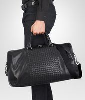 Bottega Veneta® BORSA DA VIAGGIO NERA IN NAPPA LAVATA INTRECCIATA Bottega Veneta® BORSA DA VIAGGIO NERA IN NAPPA LAVATA INTRECCIATA