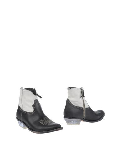 Полусапоги и высокие ботинки Golden Goose