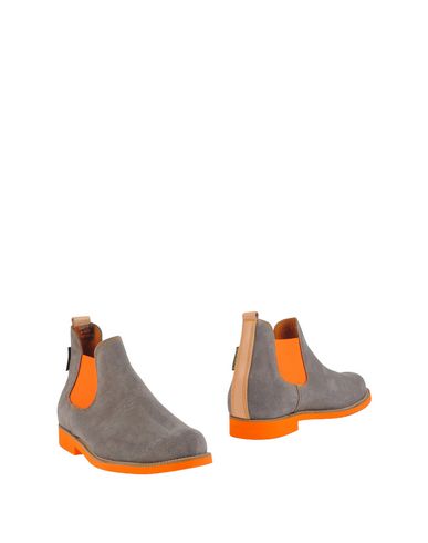 Полусапоги и высокие ботинки Neon Boots