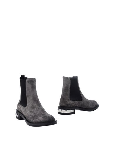 Полусапоги и высокие ботинки Miu Miu