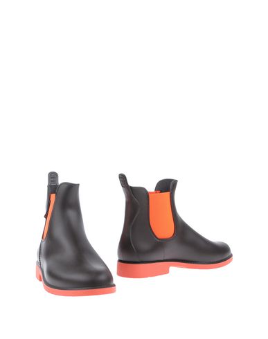 Полусапоги и высокие ботинки Neon Boots