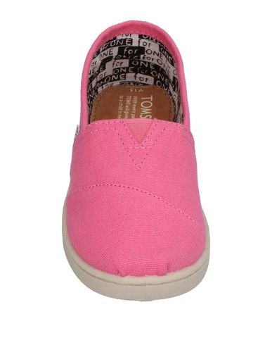 фото Низкие кеды и кроссовки Toms