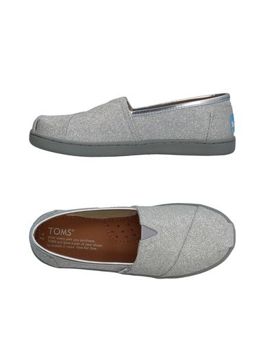 фото Низкие кеды и кроссовки Toms