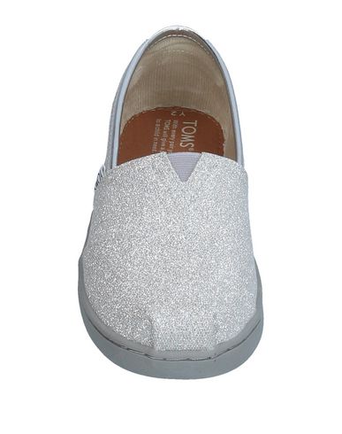 фото Низкие кеды и кроссовки Toms