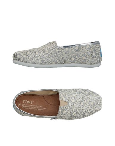 фото Низкие кеды и кроссовки Toms