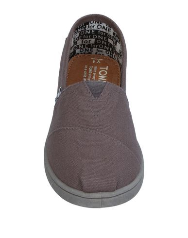 фото Низкие кеды и кроссовки Toms