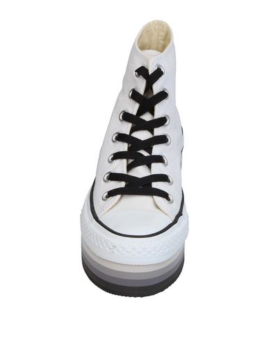 фото Высокие кеды и кроссовки converse