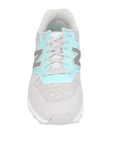 фото Низкие кеды и кроссовки new balance