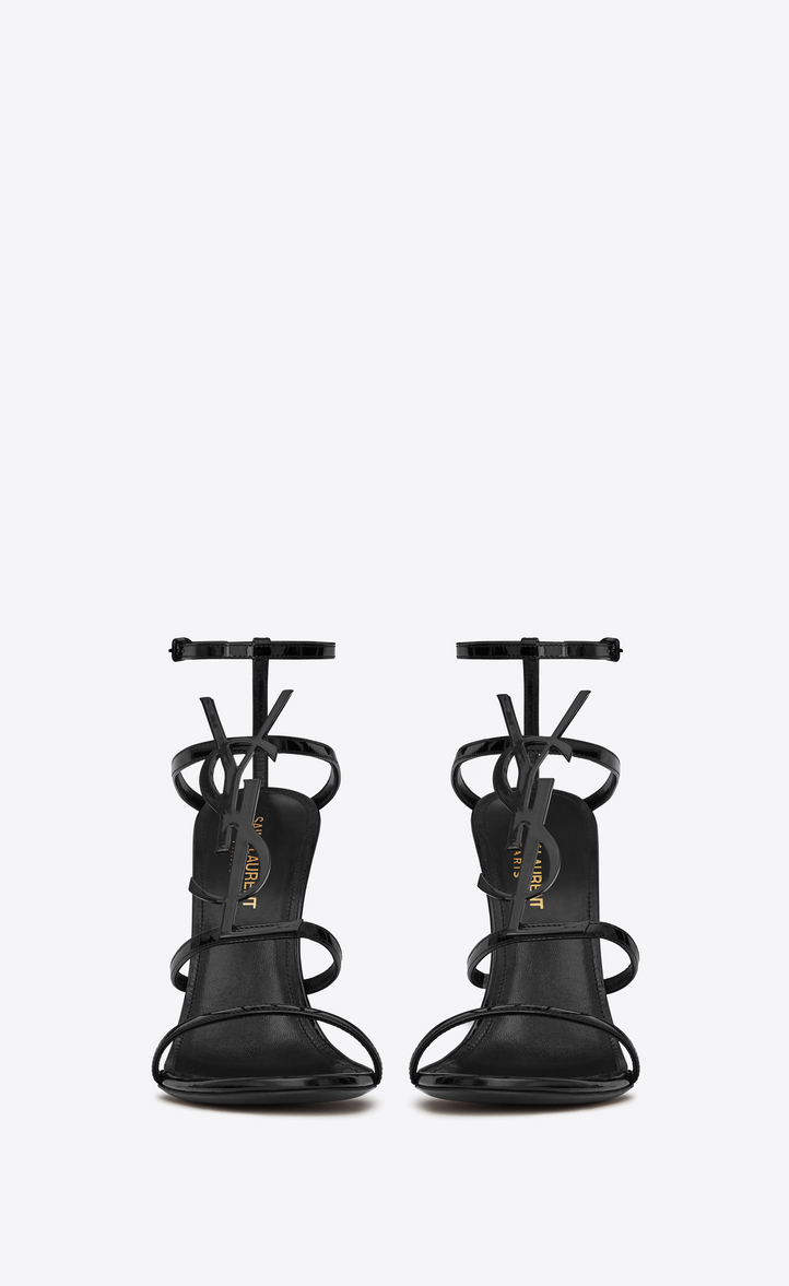 Click to view more detailed imagery on our partner's website Saint Laurent Cassandra Sandals With Black Logo In Patent Leather (110)
