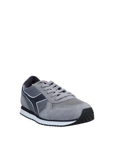 фото Низкие кеды и кроссовки Diadora