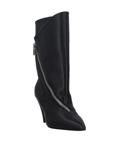 фото Полусапоги и высокие ботинки Givenchy