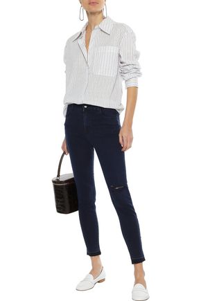 Click to view more detailed imagery on our partner's website J Brand Alana Distressed Mid-rise Skinny Jeans In Mid Denim